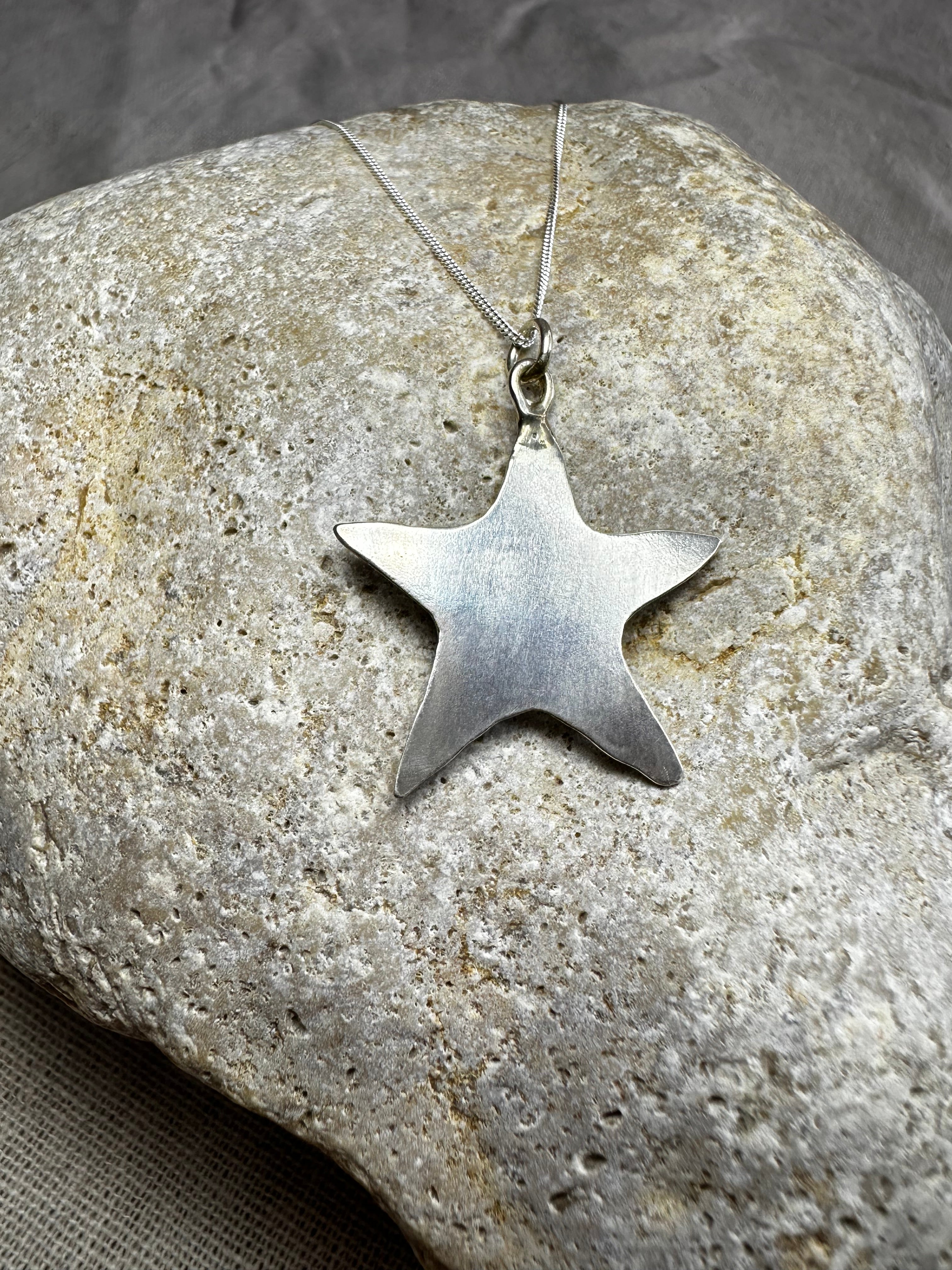 COLGANTE ESTRELLA DE MAR ÁMBAR
